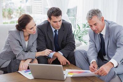 Financing specialist discussing payment plans with customer