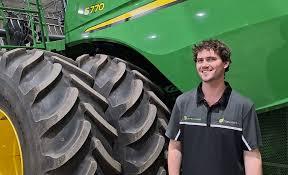 Smiling Louisiana Tractors technician at service desk